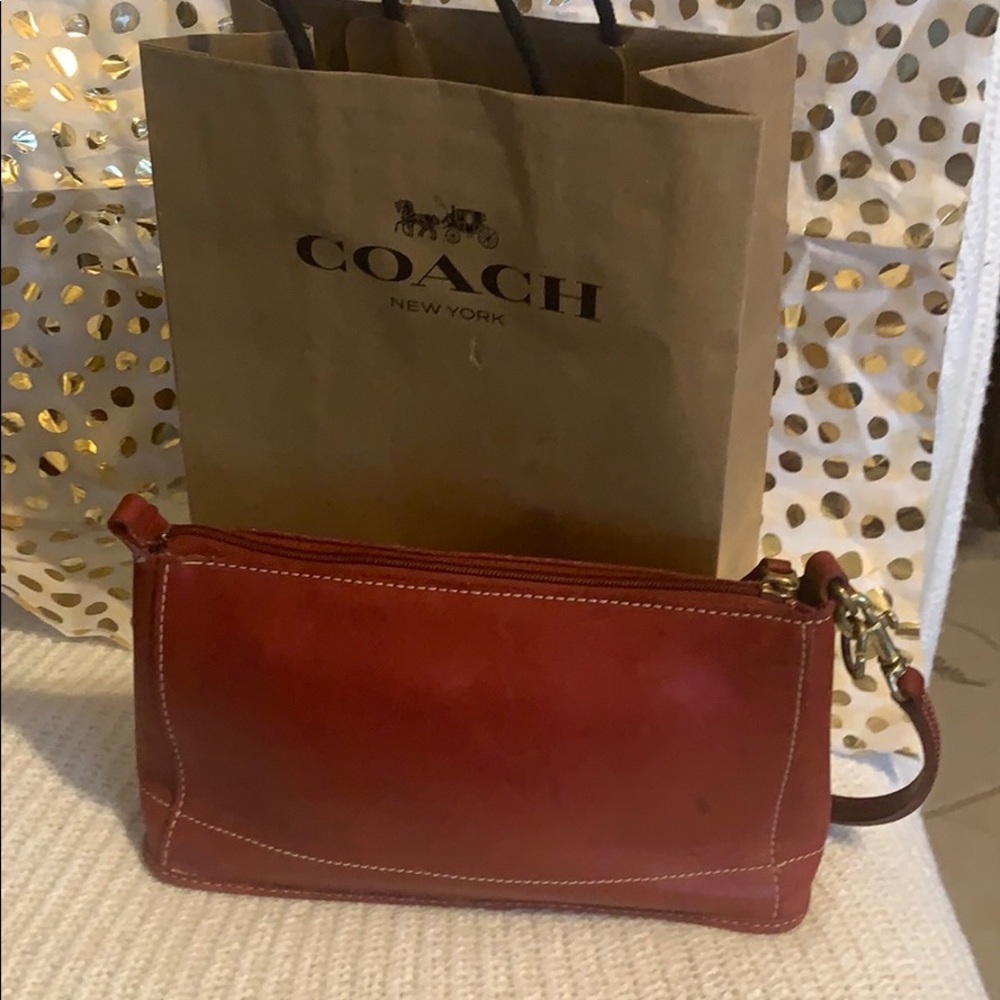Coach Red Wrist purse easy and sassy to wear.